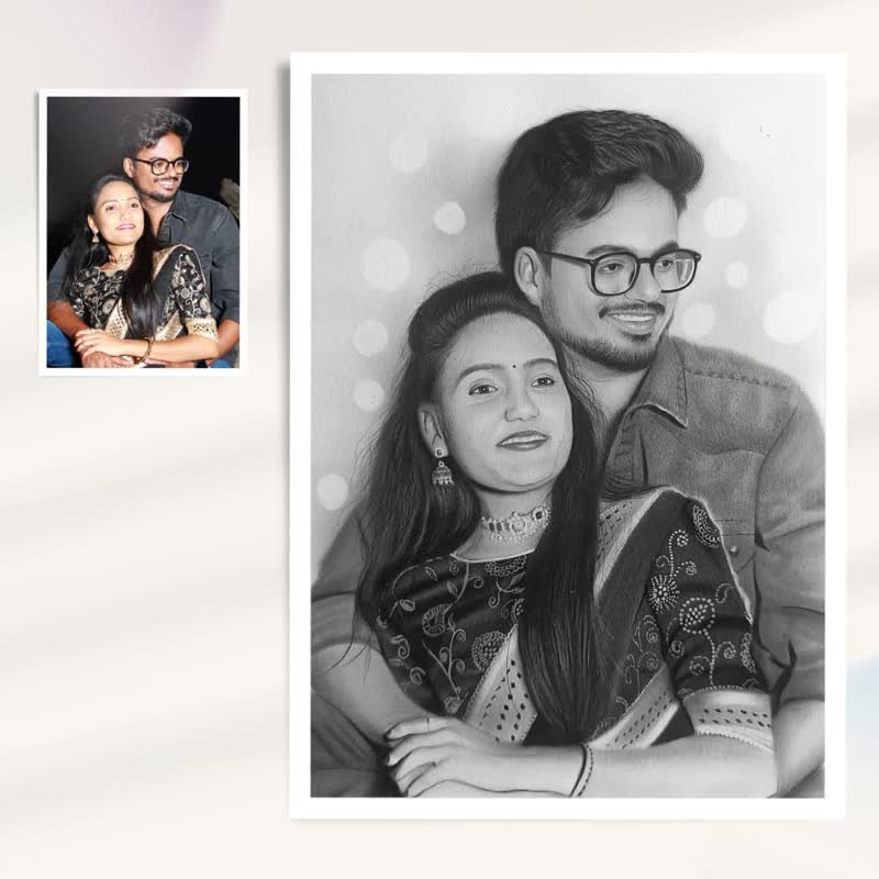 A photograph of a couple beside the finished pencil portrait drawn from it by hand